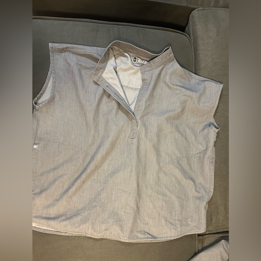 Color: gray, older pair from 2020. Unsure of pants style. Shirt: Rafaela